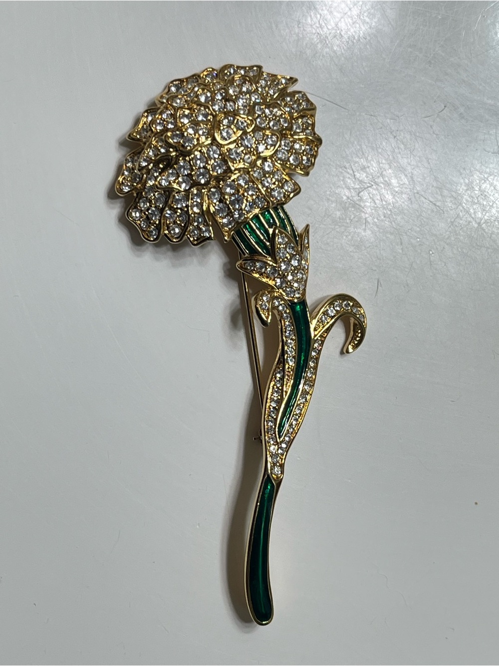 Nolan Miller Gold-tone Carnation Brooch With Clear Crystal & Green Enamel Accent